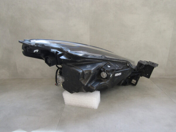 Koplamp Mazda 2 DJ LED-14-19 D09K51040 Links Q752/K5 11A