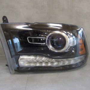 KOPLAMP DODGE RAME 1500 REBEL ZWARTE NORMALE LENS 13- LINKS S1011/4K/8F