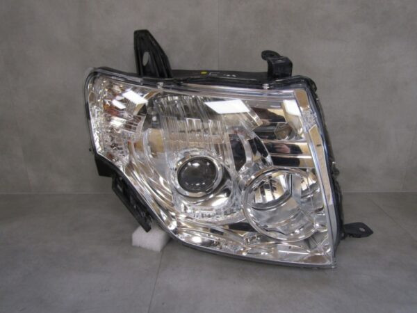 KOPLAMP MITSUBISHI PAJERO IV 4 06- XENON RECHTS  A1469/4K/3C