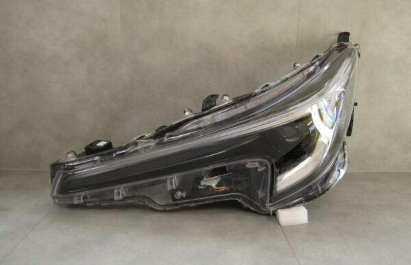 Koplamp TOYOTA COROLLA E21 HB KOMBI Facelift Volledig ED LH Links 23- S1593/K3/4B