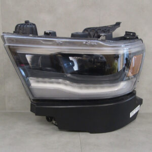 Koplamp DODGE RAM V 1500 LED DONKER USA 19- LH Links P68533275AB S1587/K3/4E