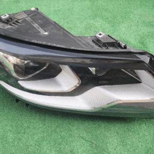 Koplamp Volkswagen TIGUAN 1 I FACELIFT BI-XENON TURNING FRONT LAMP