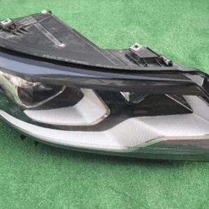 Koplamp Volkswagen TIGUAN 1 I FACELIFT BI-XENON TURNING FRONT LAMP