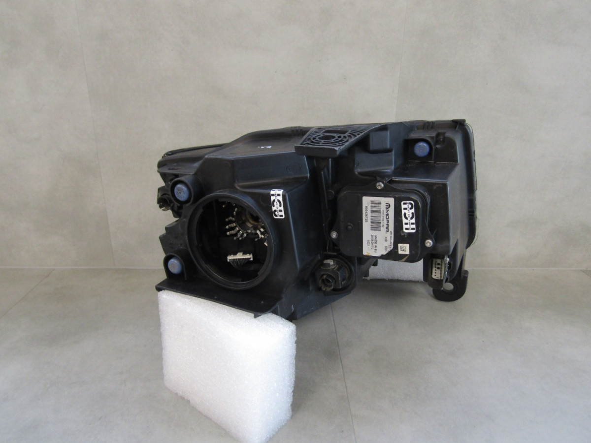 KOPLAMP JEEP GRAND CHEROKEE WK2 XENON DRAAIEN 13-16 LH A931/E103