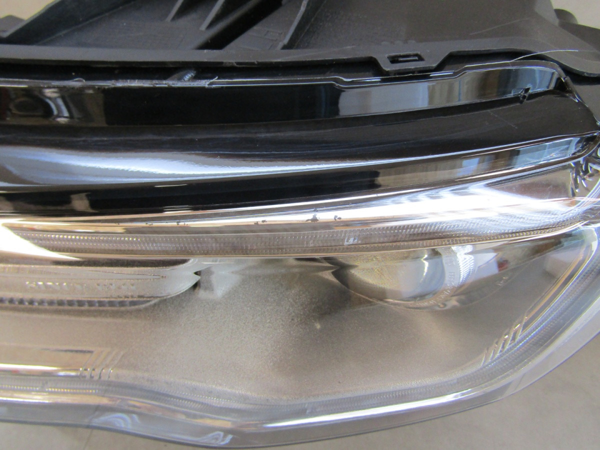 KOPLAMP JEEP GRAND CHEROKEE WK2 XENON DRAAIEN 13-16 LH A931/E103