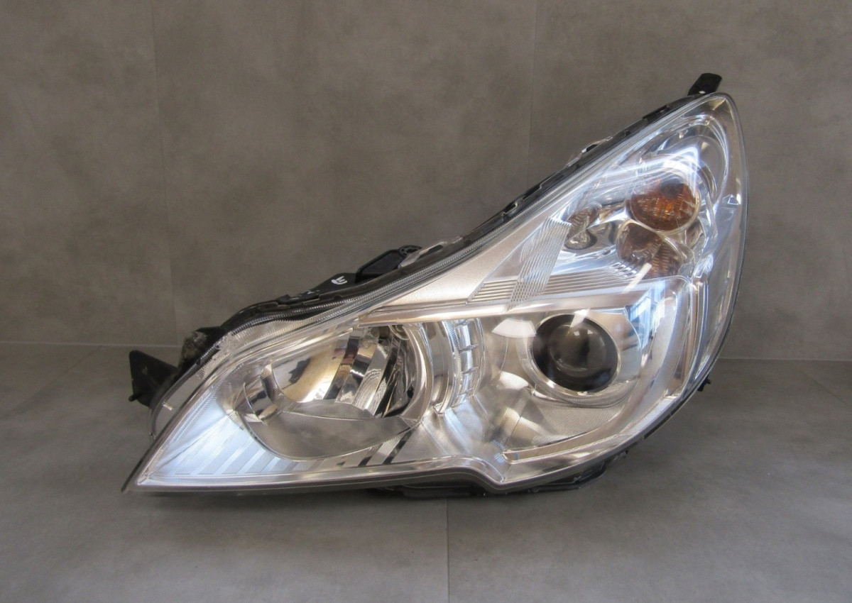 Koplamp SUBARU LEGACY V OUTBACK IV XENON 09-12 LH LINKS A1287/5K/10E