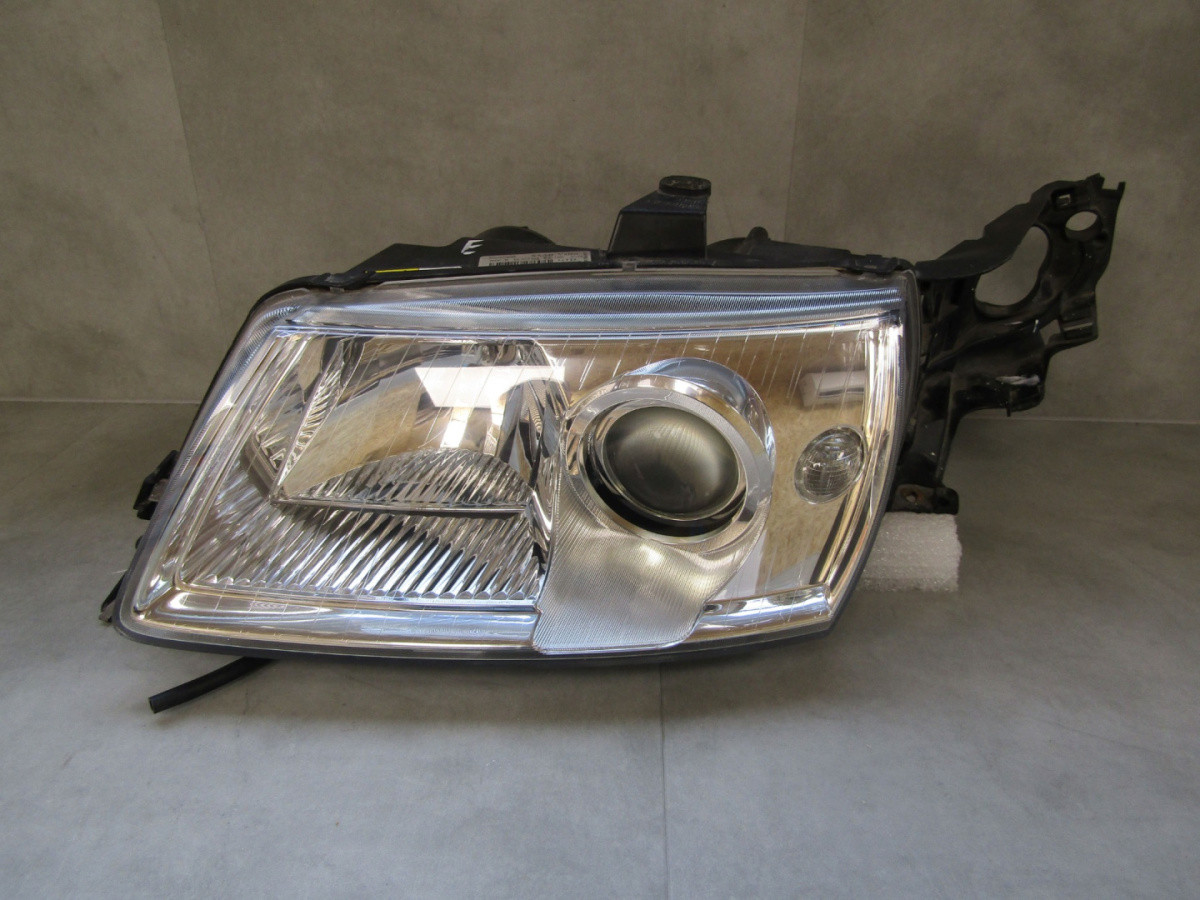 Koplamp Saab 9-5 95 Facelift XENON 05-09 LH 89010466 Q318/B142