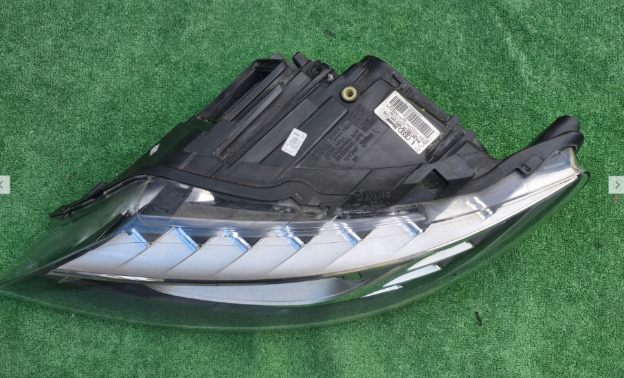 Koplamp AUDI Q7 4L0 FACELIFT BI-XENON TURNING FRONT LAMP 89321251