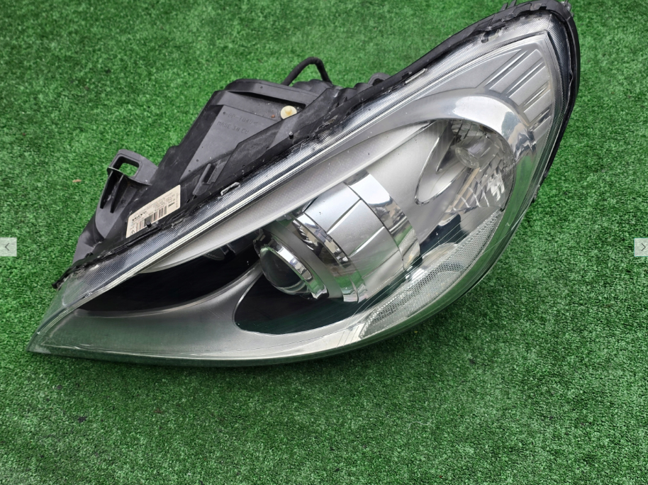 Koplamp VOLVO S60 V60 BI-XENON TURNING HEADLAMP 31299990-LH