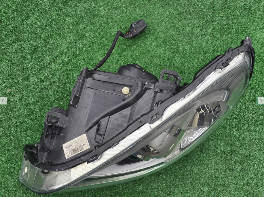 Koplamp VOLVO S60 V60 BI-XENON TURNING HEADLAMP 31299990-LH
