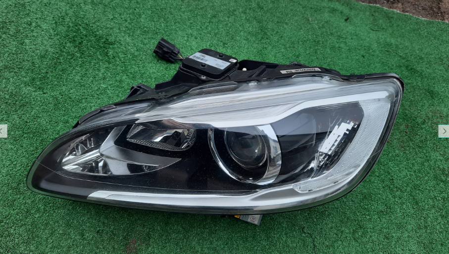 Koplamp VOLVO S60 V60 FACELIFT BI-XENON TURNING FRONT LAMP 31420261
